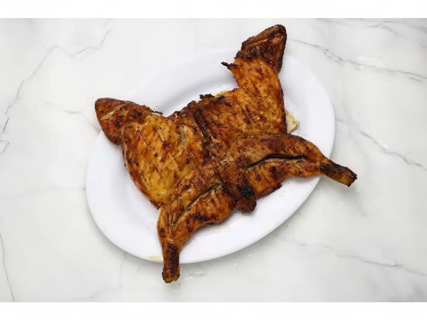 نصف حبة دجاج على الفحم سادة