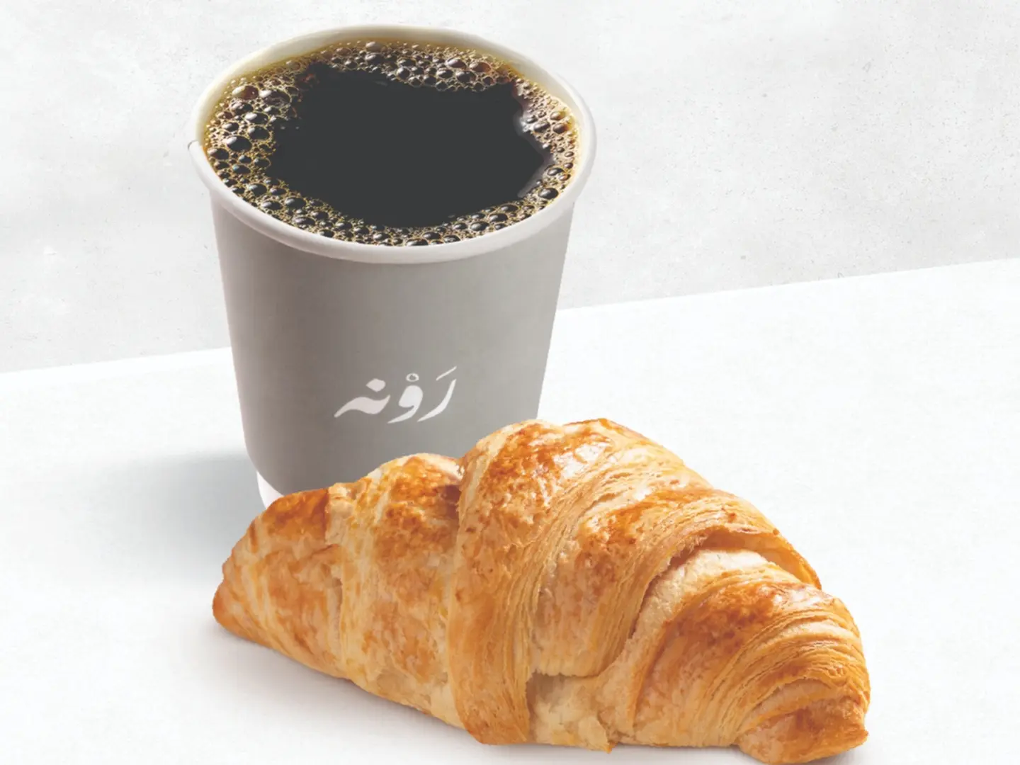 كروسون مع قهوة مقطرة ڤي ٦٠