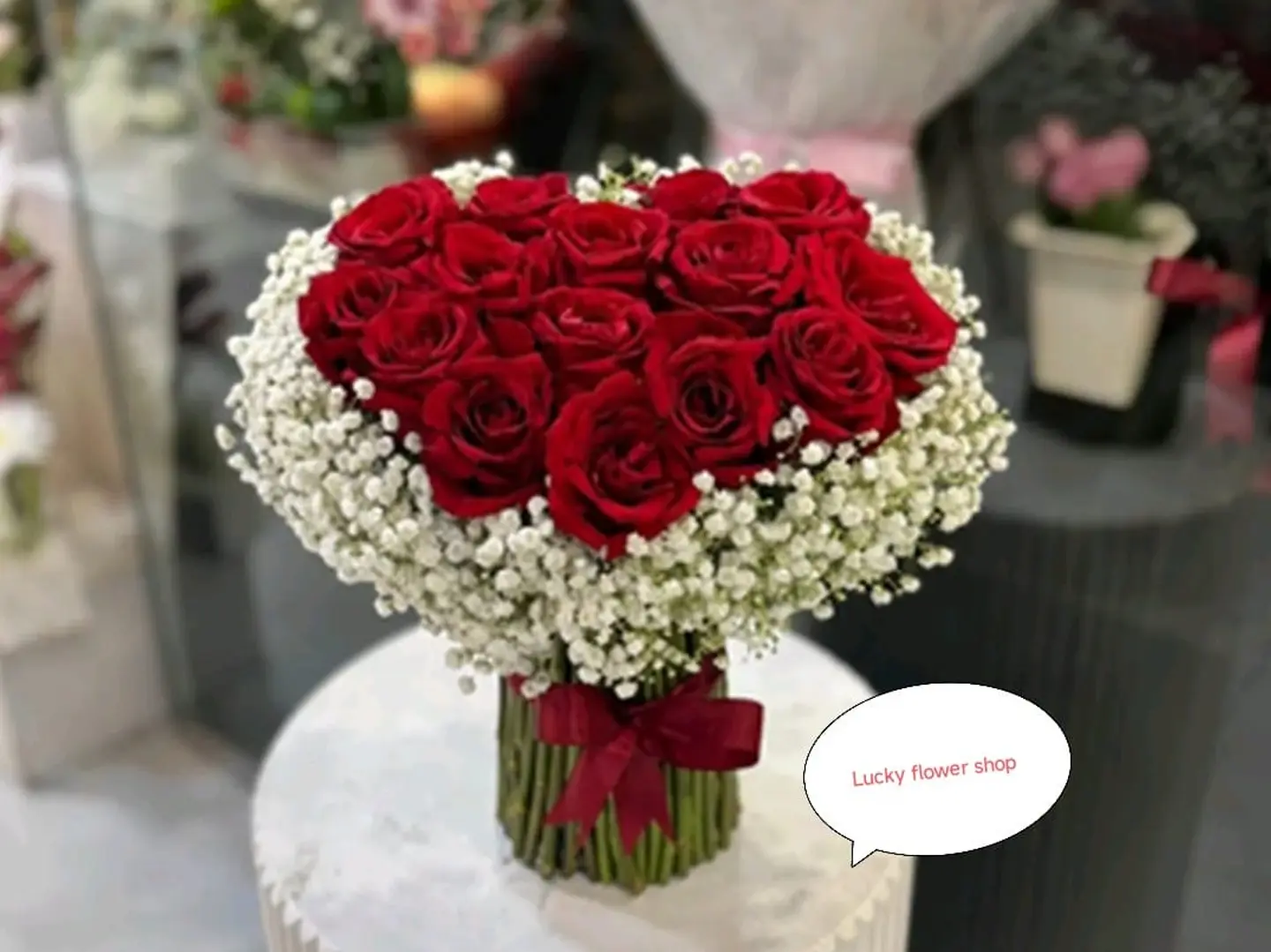 &13 Red Heart Bouquet
