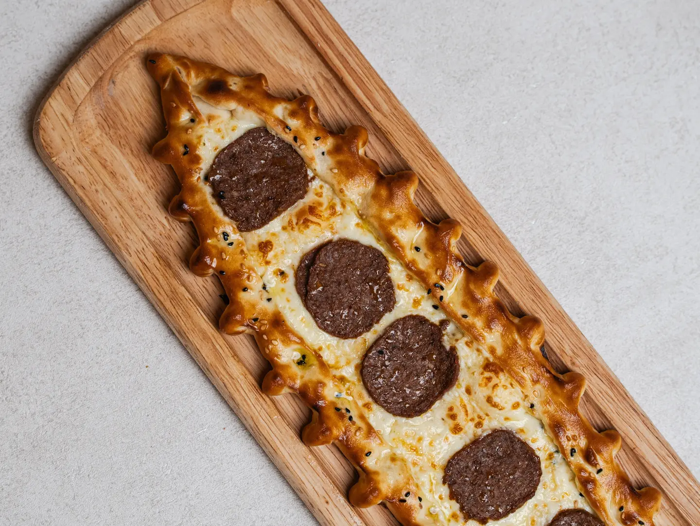 Manakish With Sausage And Cheese