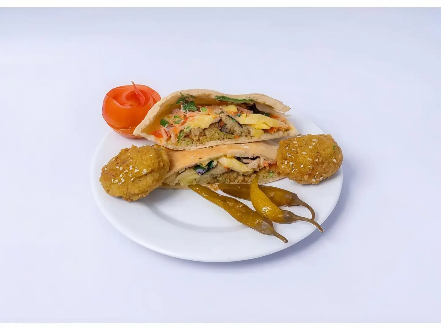 Mixed Falafel With Eggs And Mousagah