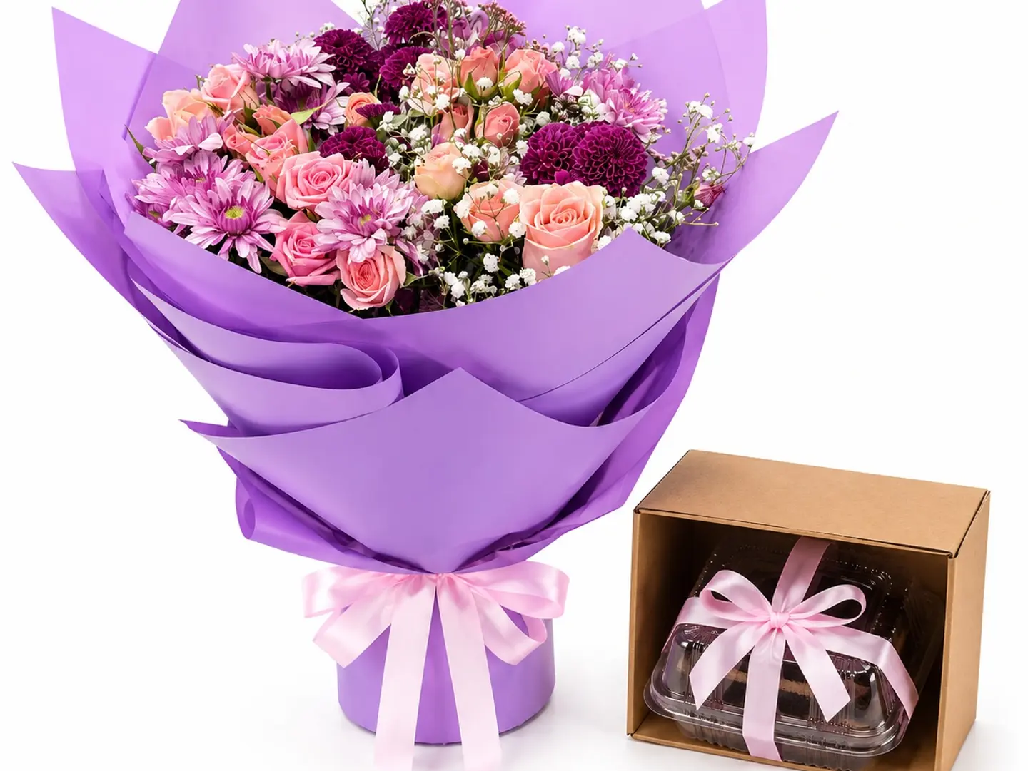 A Luxurious Bouquet Of Roses With A Rocher Cake