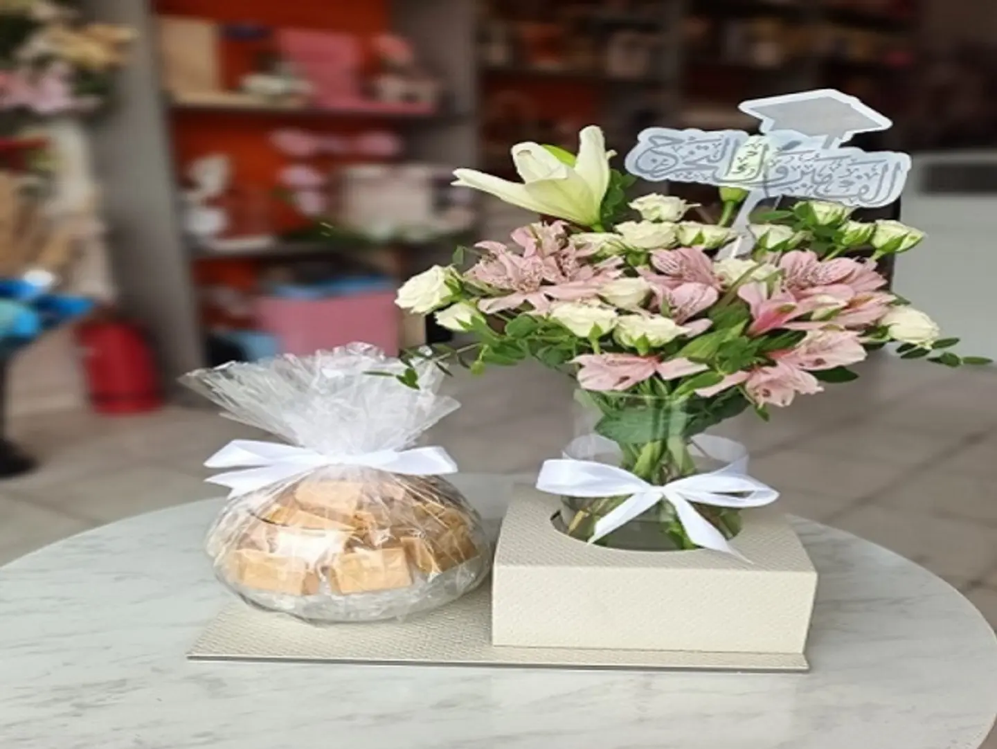 Graduation Pink Flowers And Chocolate Vase