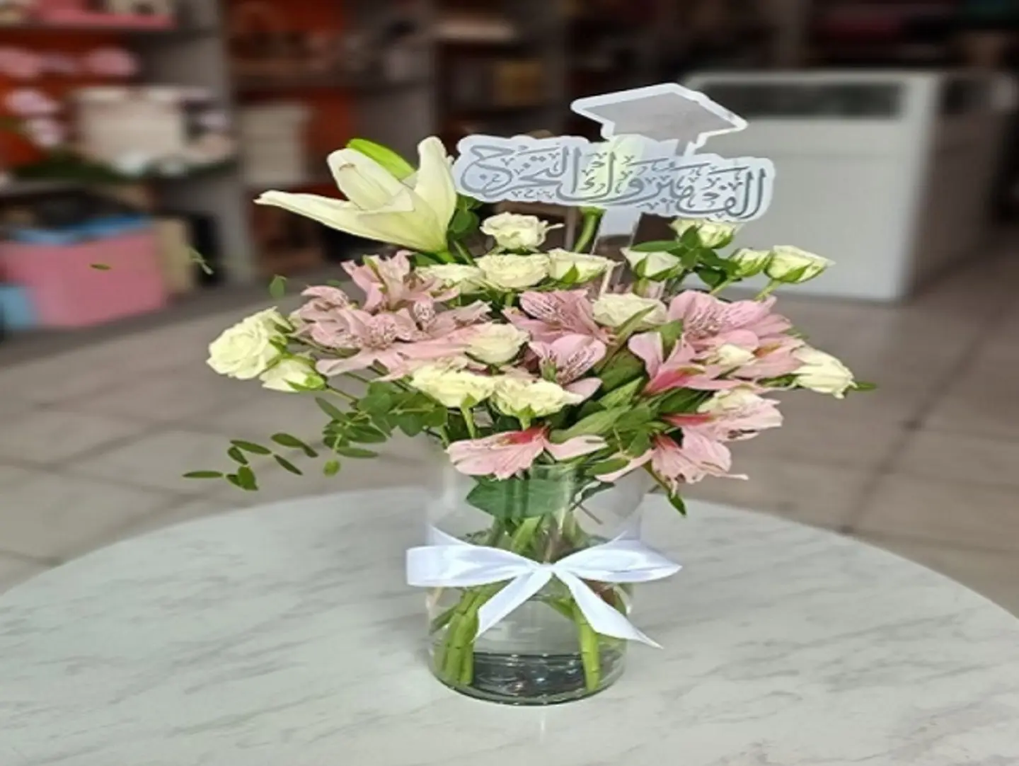 Graduation Pink Flowers In Vase