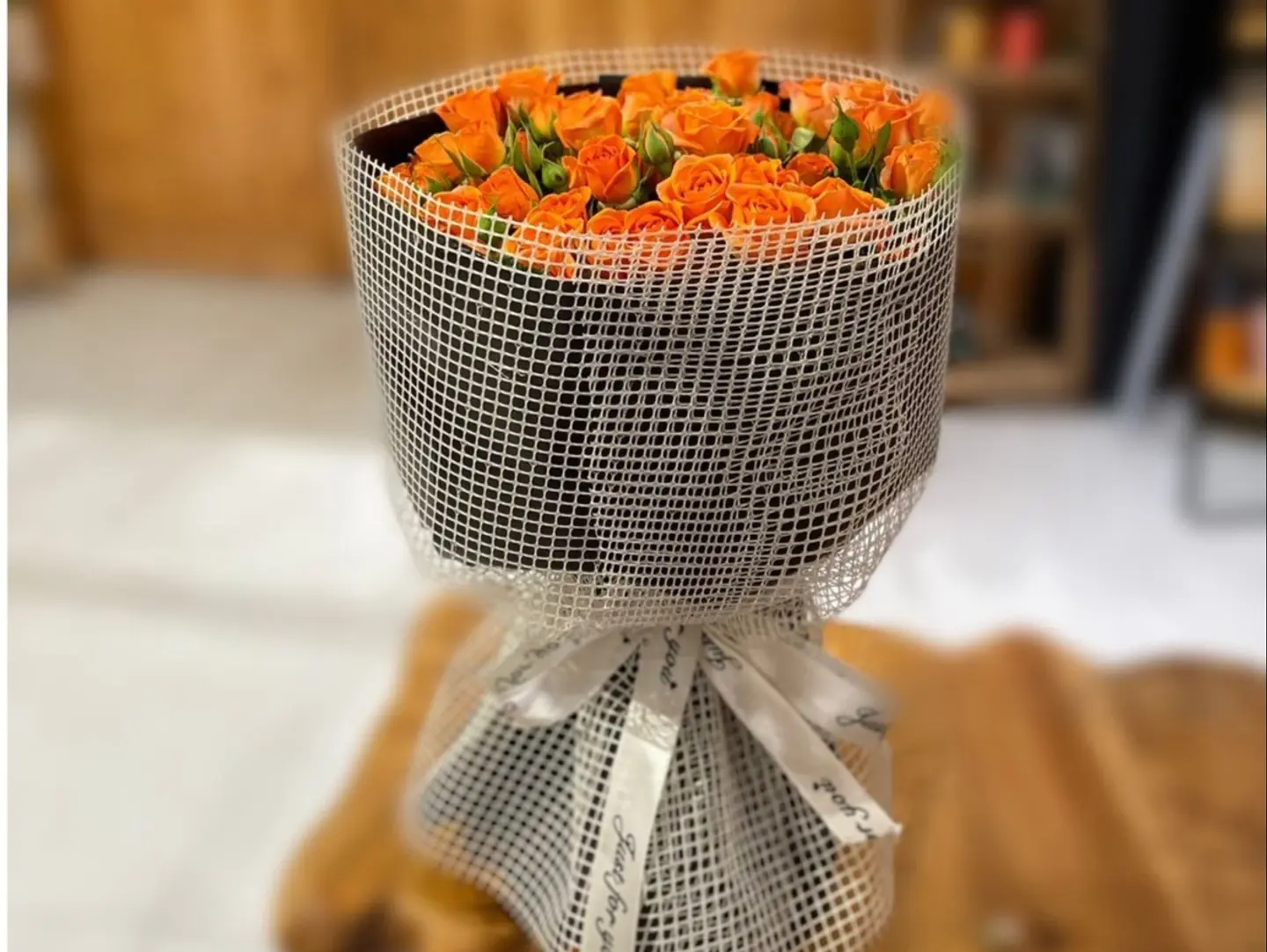 Orange Rose Bouquet With Fabric Wrapping