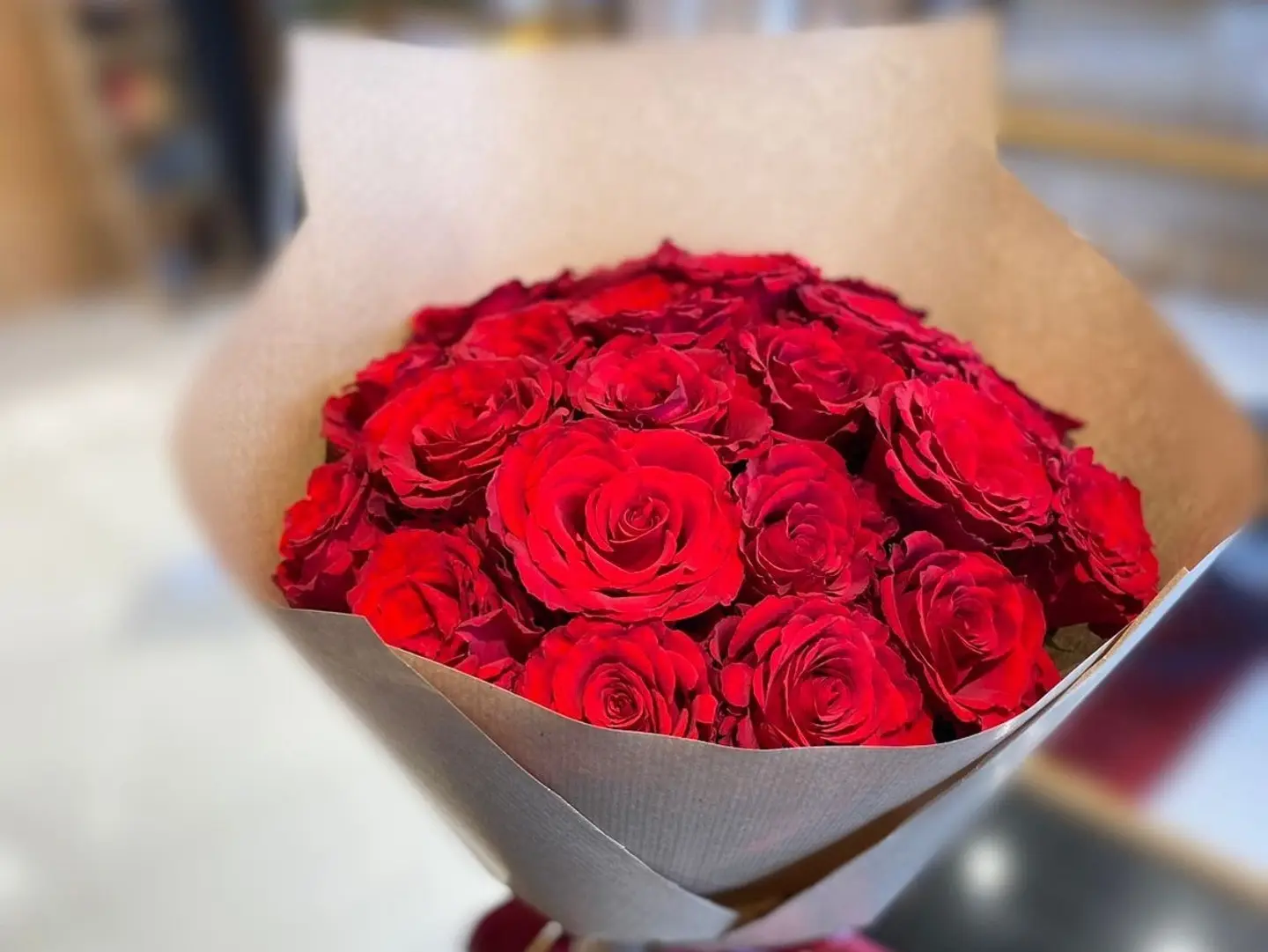 Red Rose Bouquet With Paper Wrapping