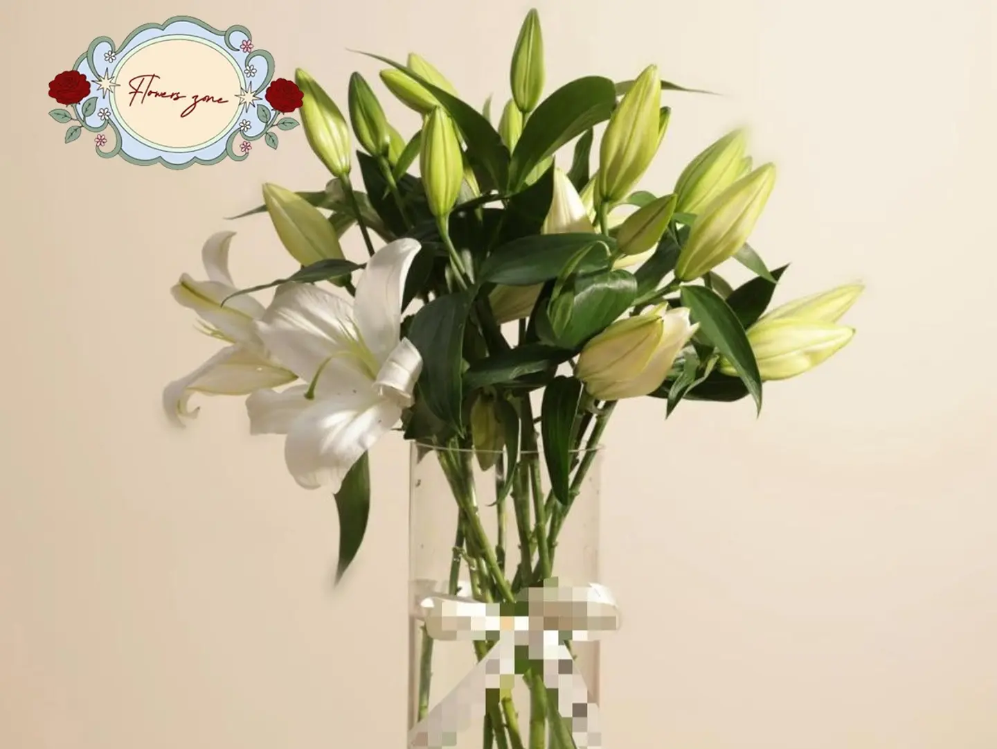 8 White Lily Stems In A Clear Vase