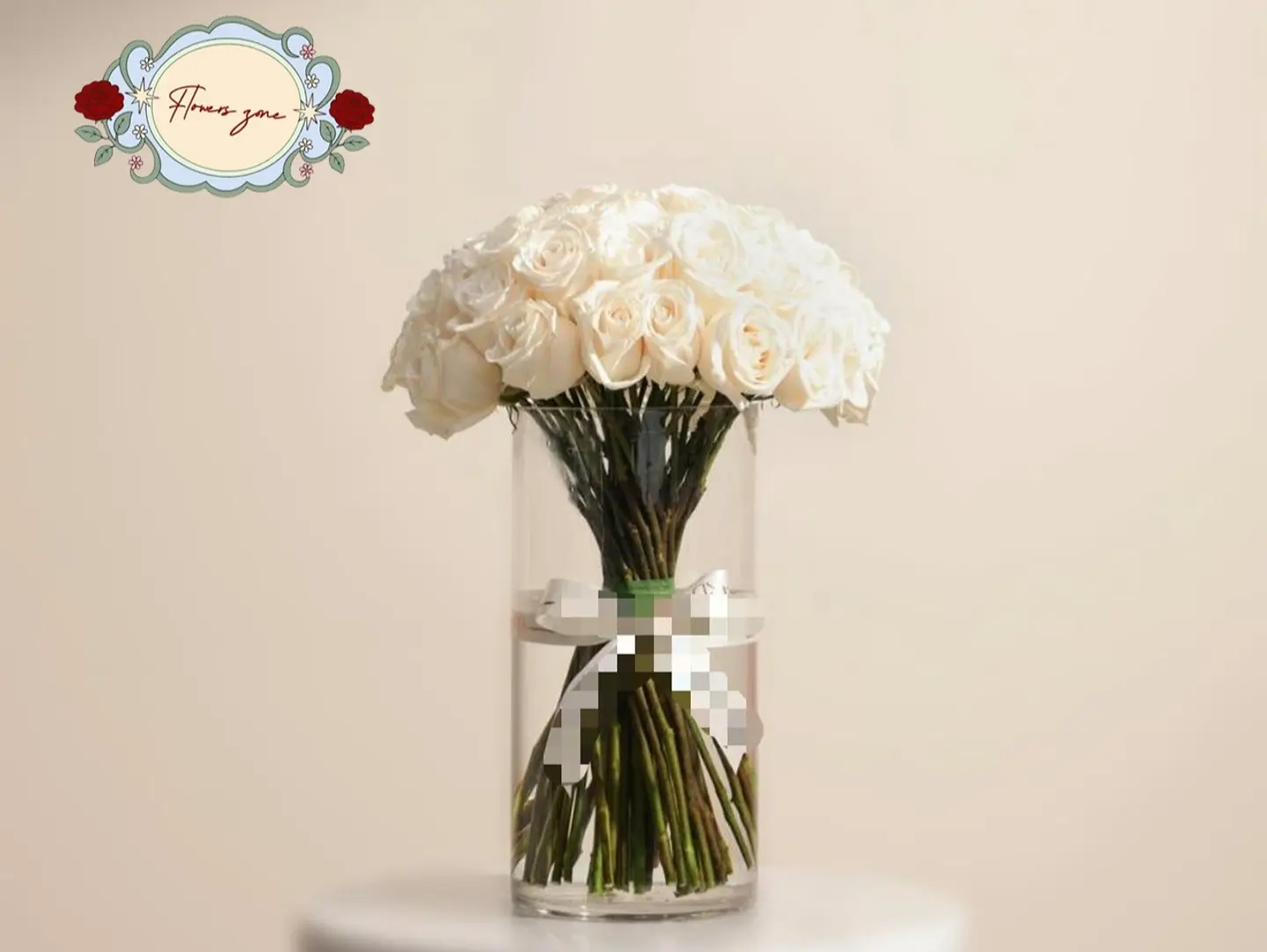 50 White Roses In A Clear Vase