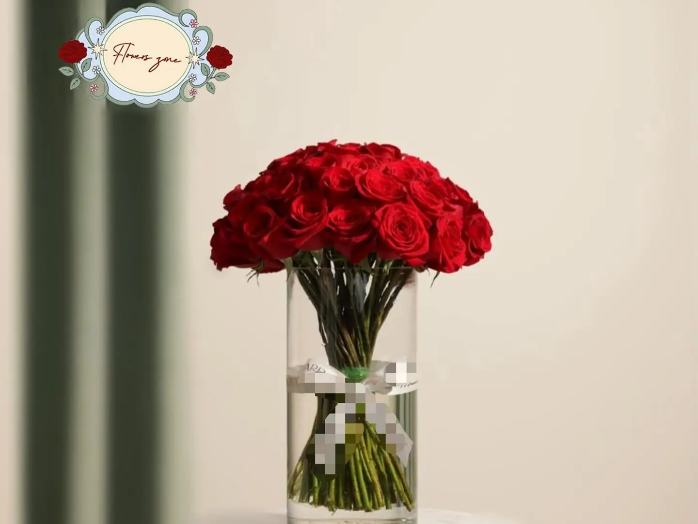 50 Red Roses In A Clear Vase