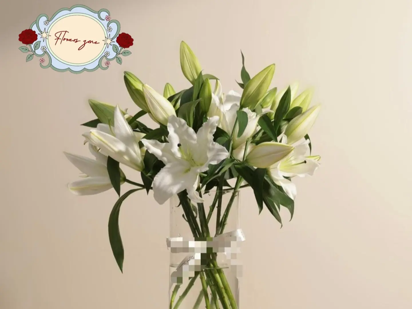 7 White Casablanca Lilies In A Clear Vase