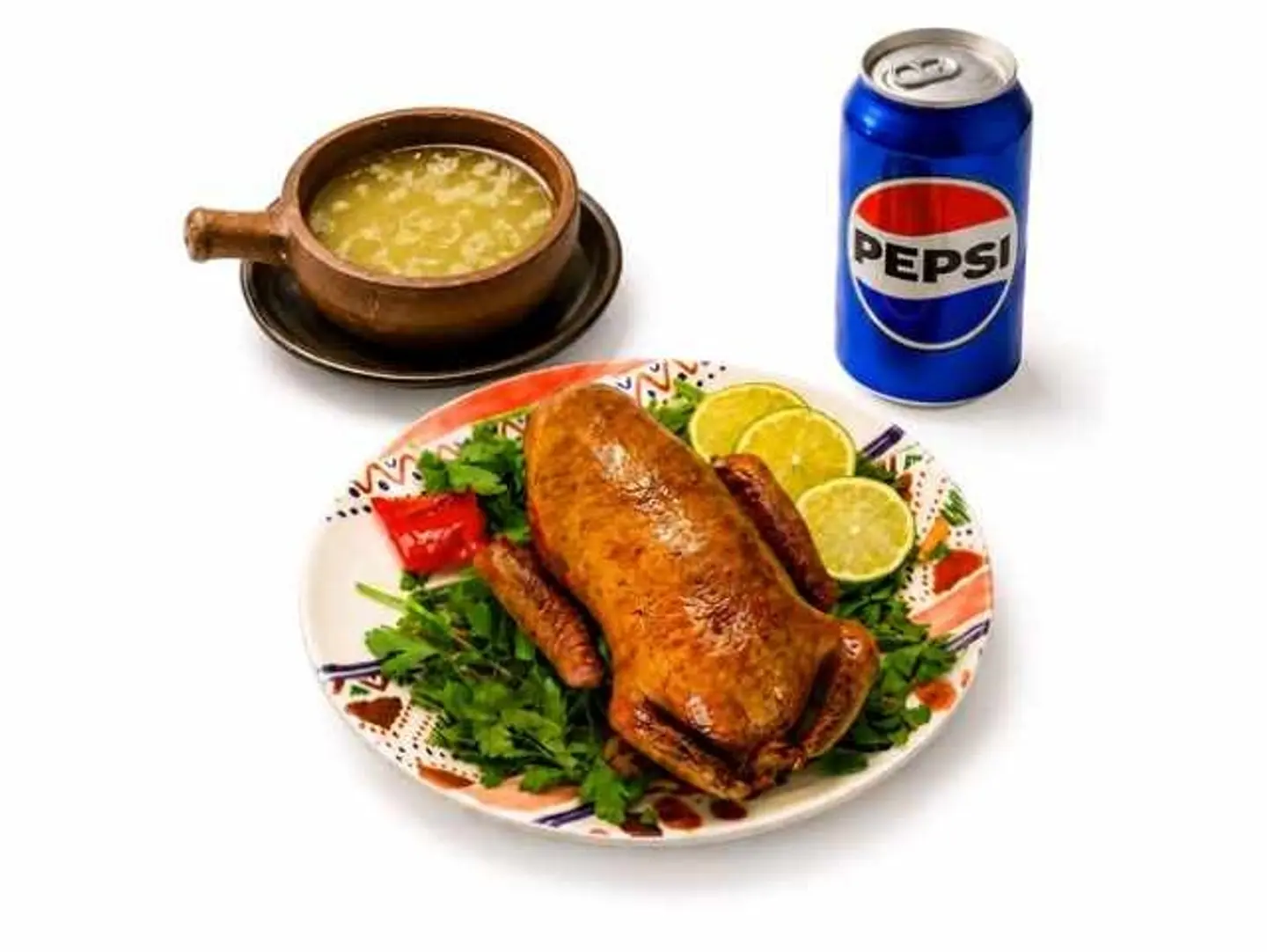 A Meal Of Pigeon With Rice And A Soft Drink