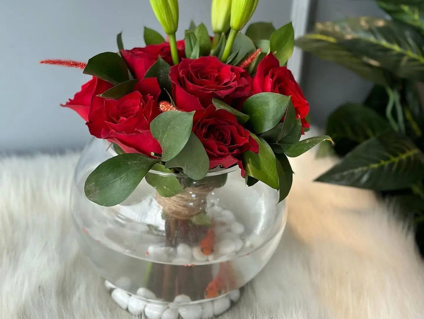 Vase Of Flowers With Ornamental Fish