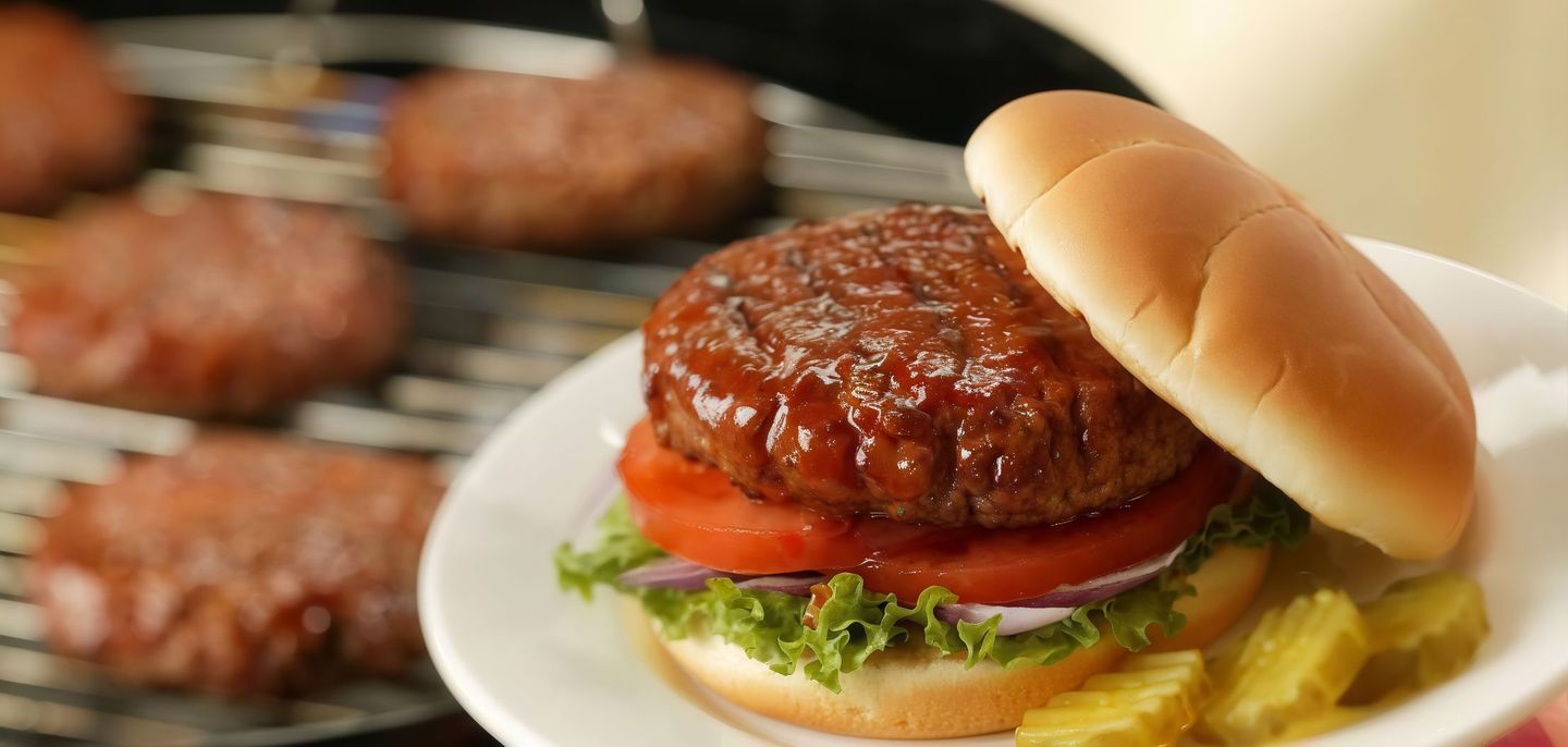 Beef Burger With Cheese And Fried Eggs