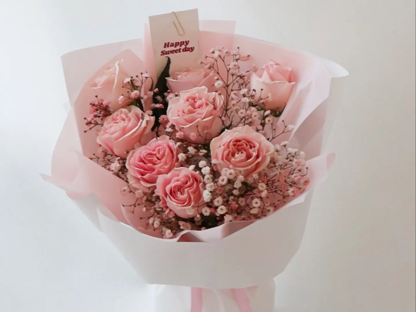 A Small Pink Bouquet Of Roses