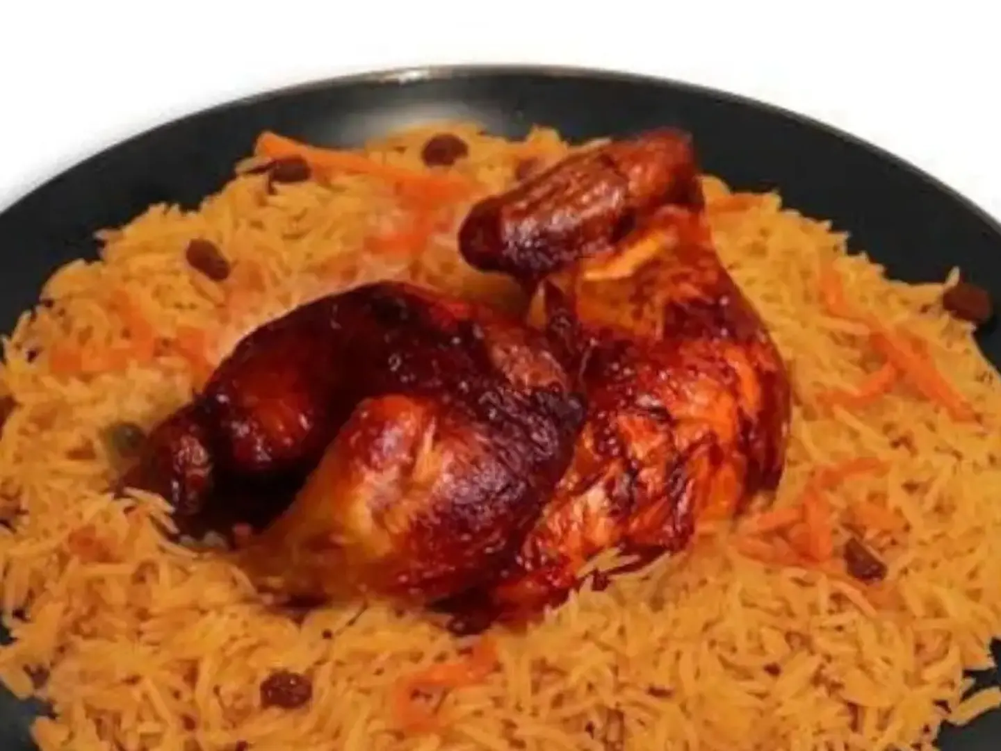 ربع دجاجة شواية مع رز بخاري