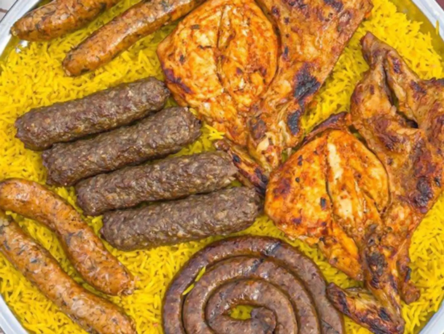 Couples Tray Half Shish Chicken   Kebab Skewer   Sausage   Mombar   Basmati Rice