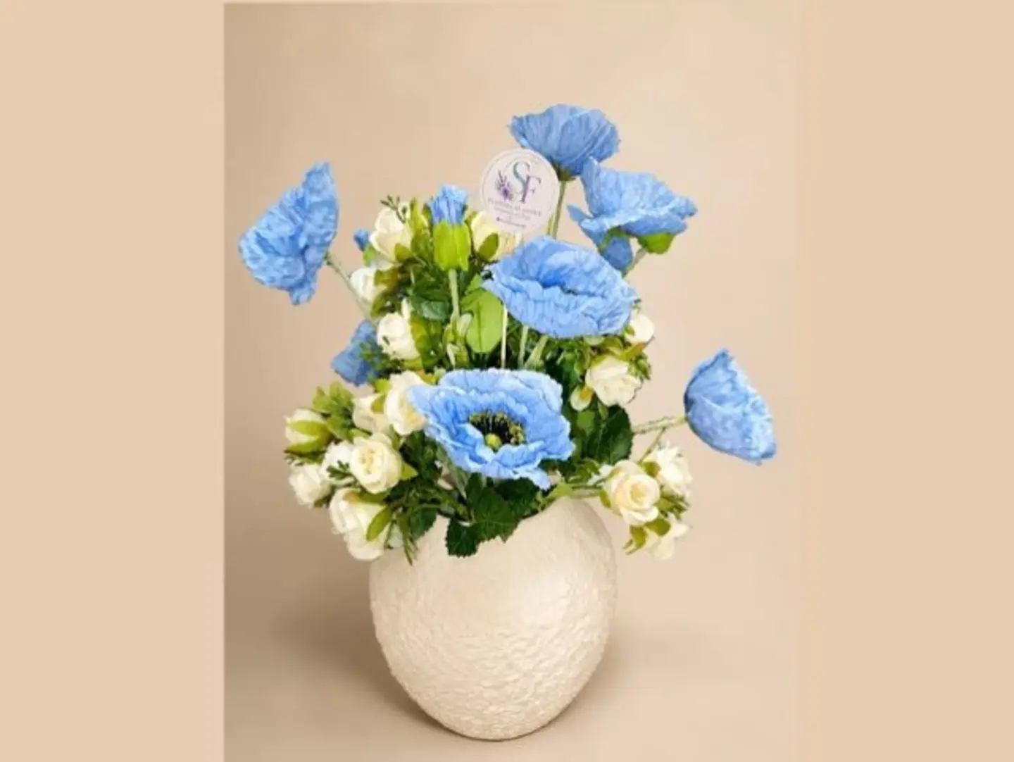 The Blue Anemone Paired With Off White Spray Roses (Artificial Flowers) Won.