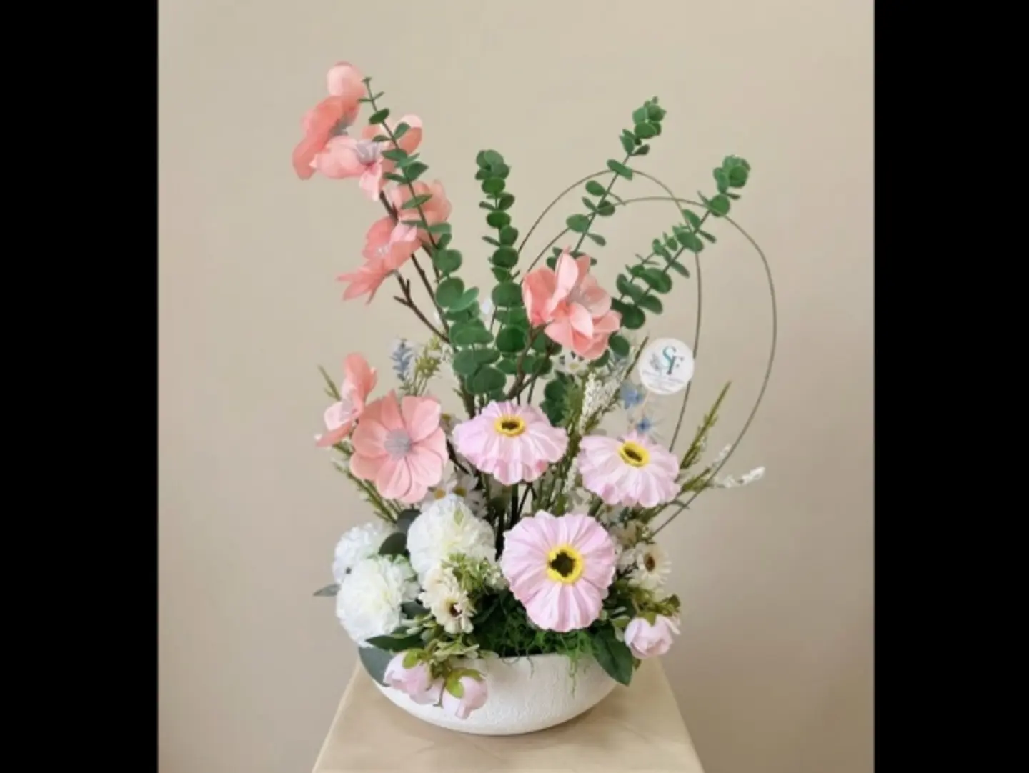 A Distinctive Bouquet Of Pink And White Artificial Tulips In A Luxurious Vase.