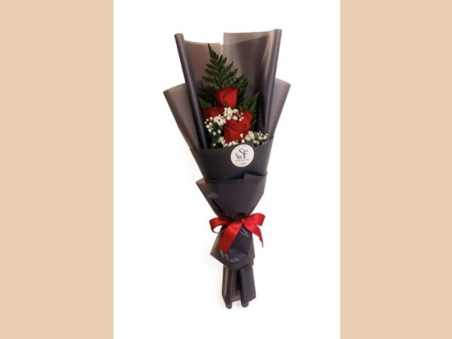 A Bouquet Of 4 Red Roses With Black Wrapping.