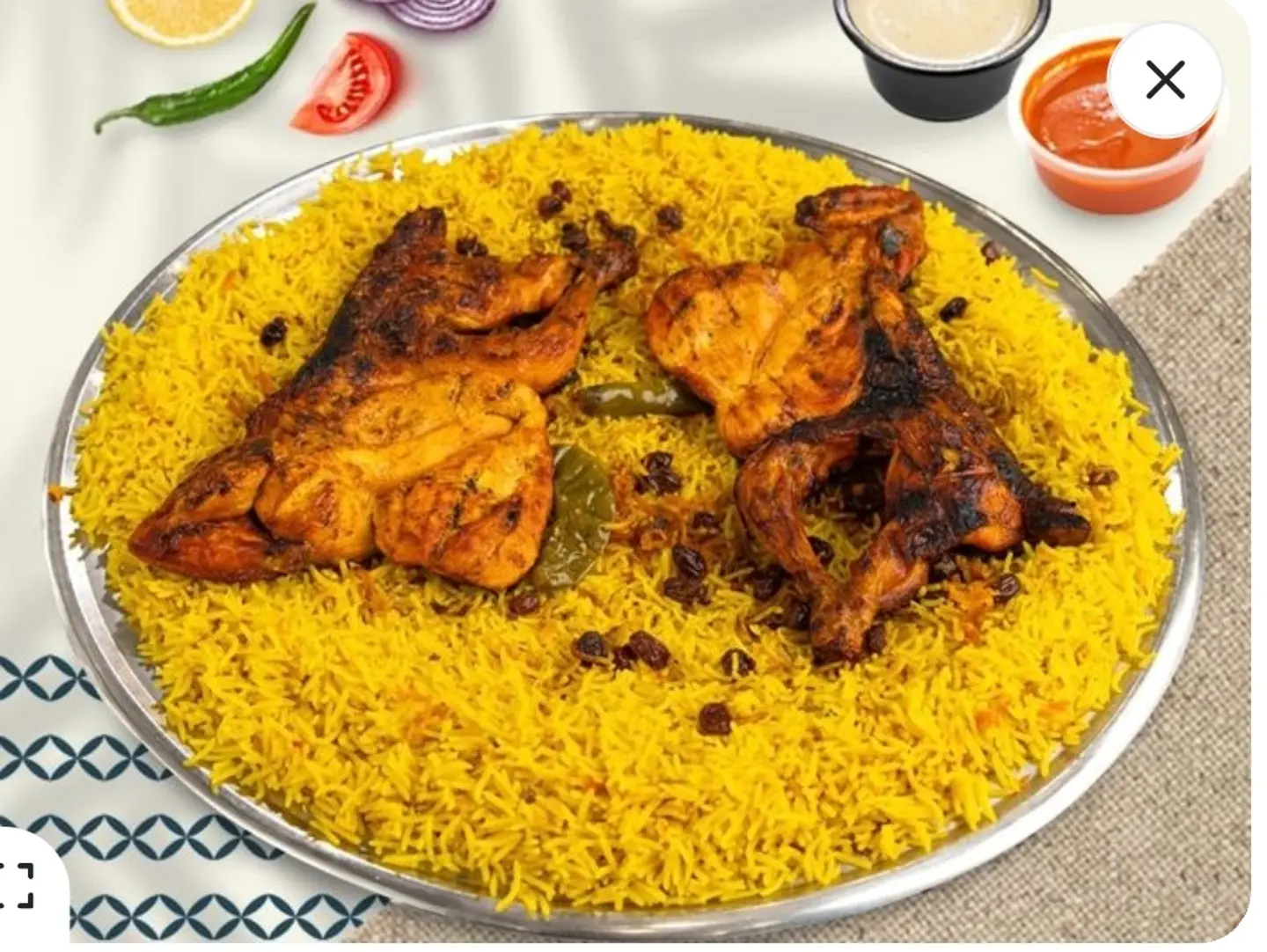 نصف دجاج على الفحم مع الرز