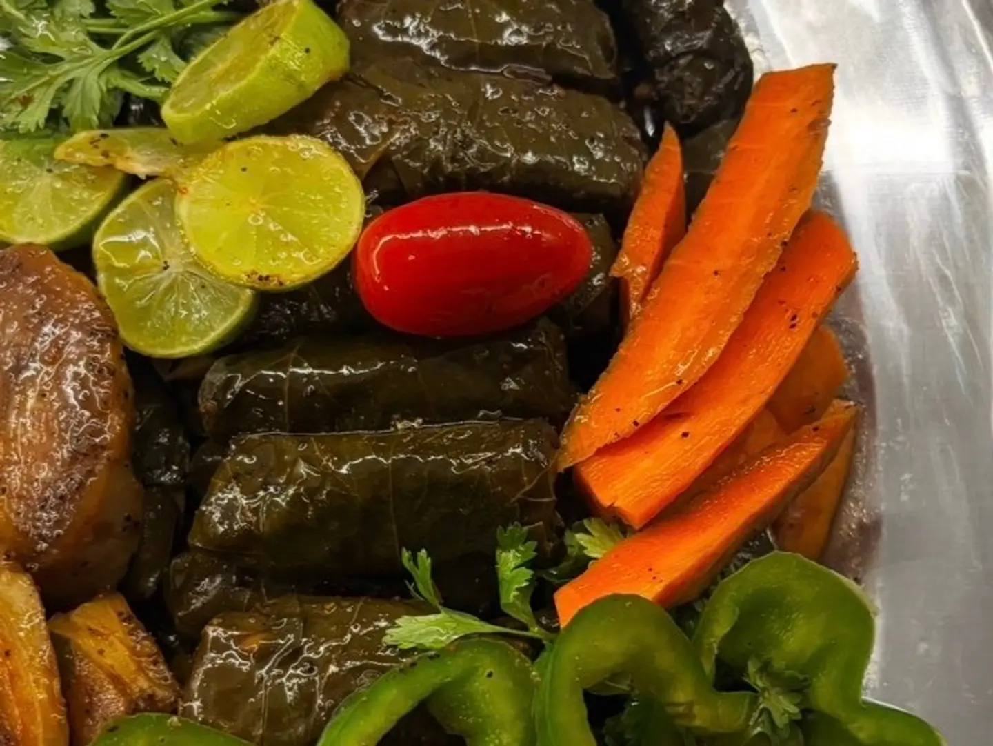 Grape Leaves, Pomegranate Molasses
