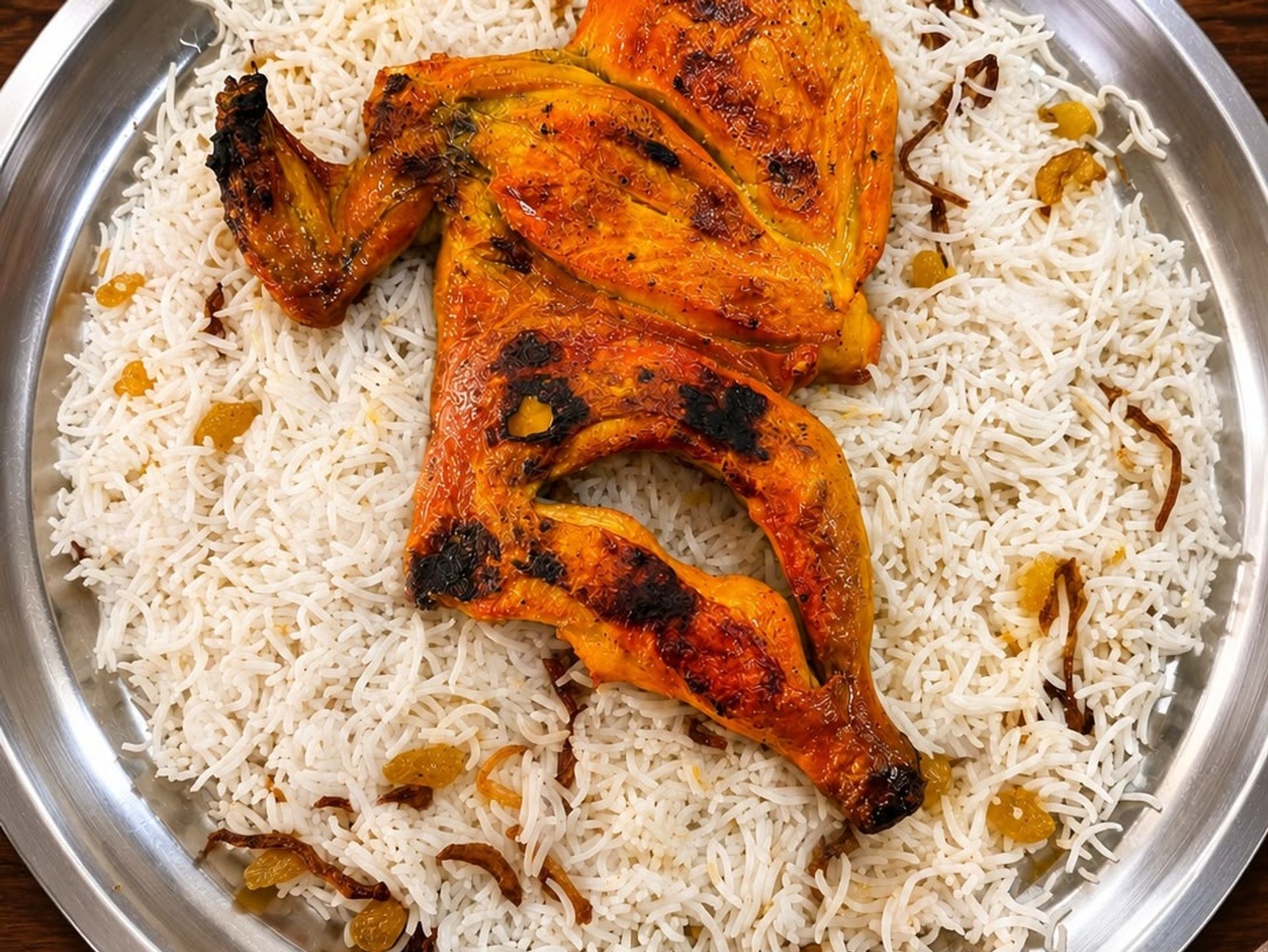 دجاج مظبي مع الرز - نص حبة
