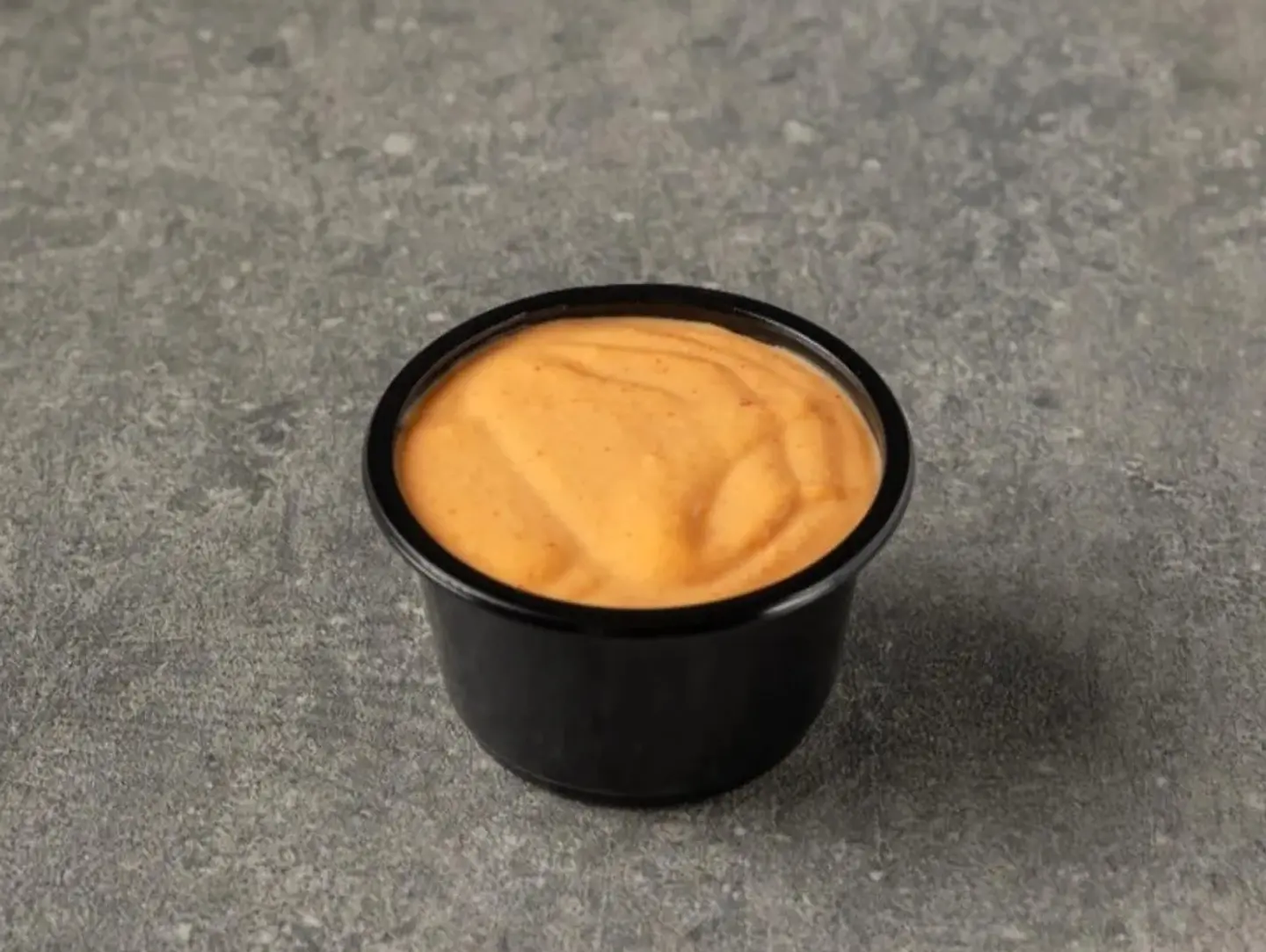 Container Of Spicy Sauce