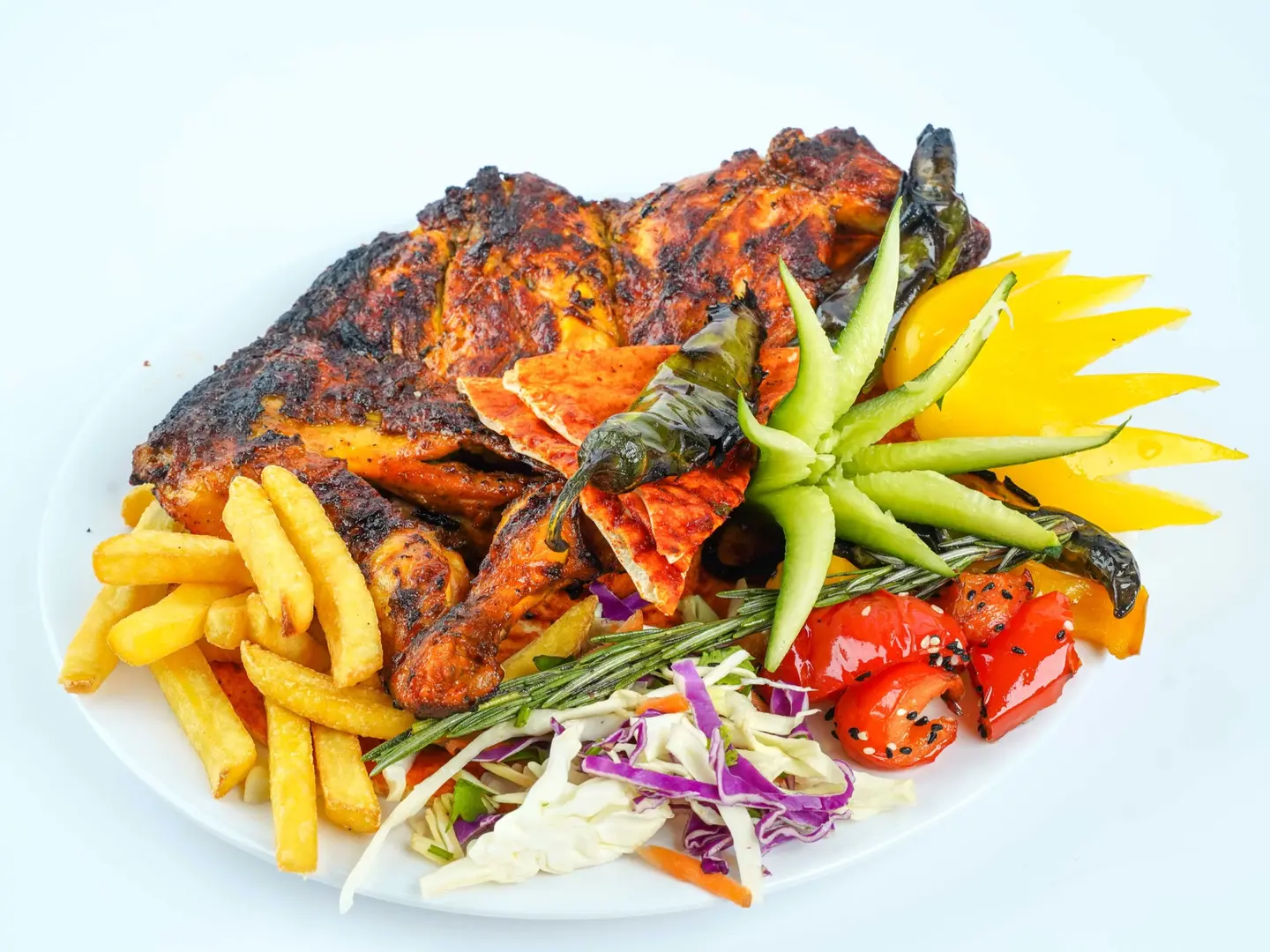 نصف حبة دجاج علي الفحم