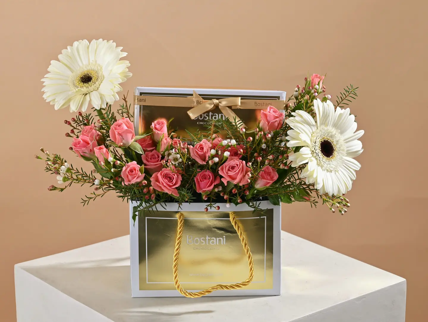 A Delicate Floral Arrangement Paired With Bostanti Chocolate