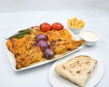 نص حبة دجاج على الفحم