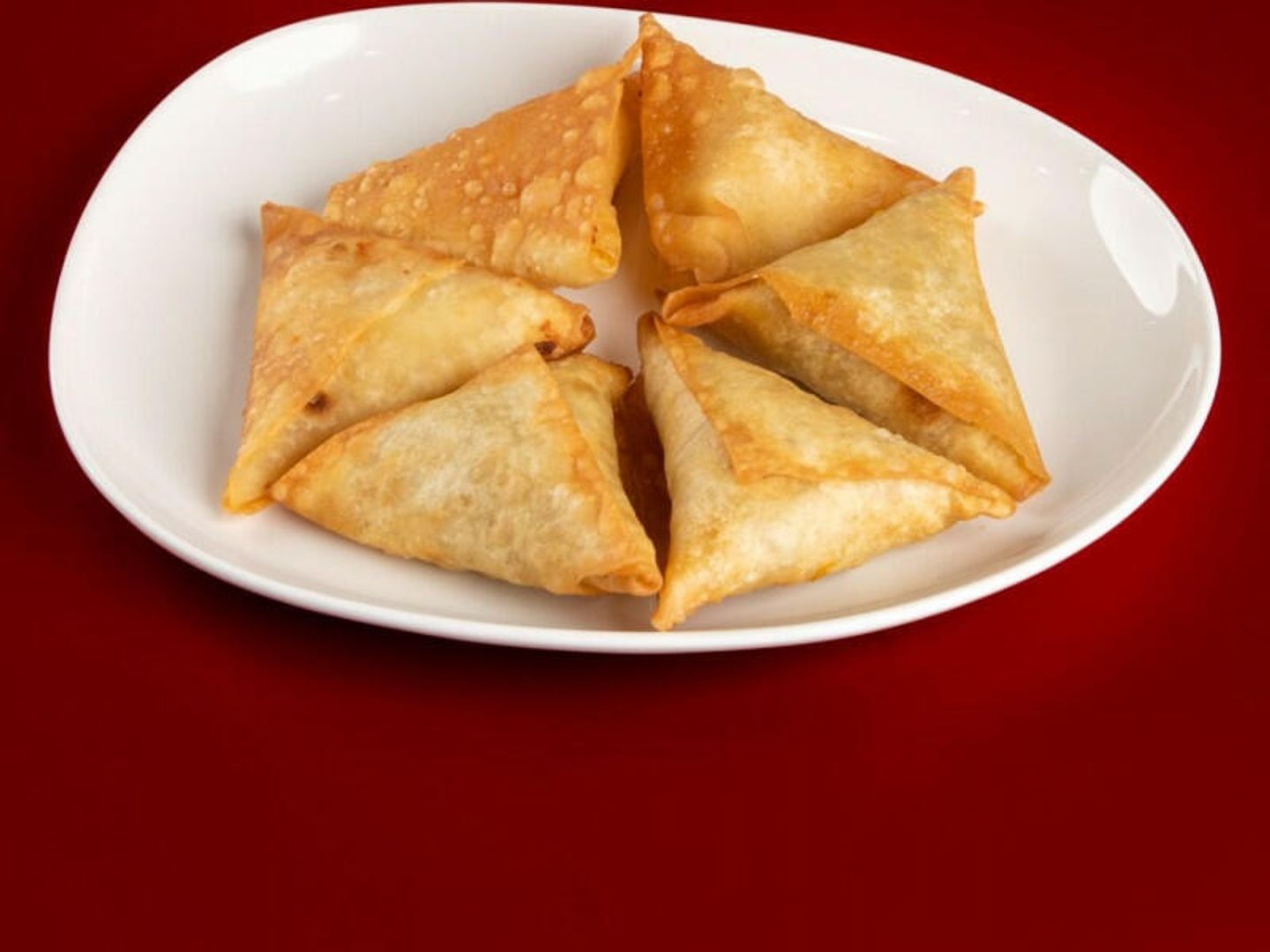 نصف كيلو سمبوسة لحم