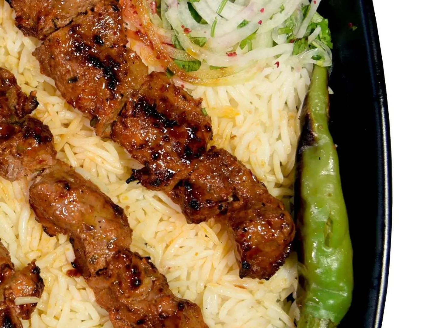 Plate Of 2 Awsal Lamb Skewers With Rice