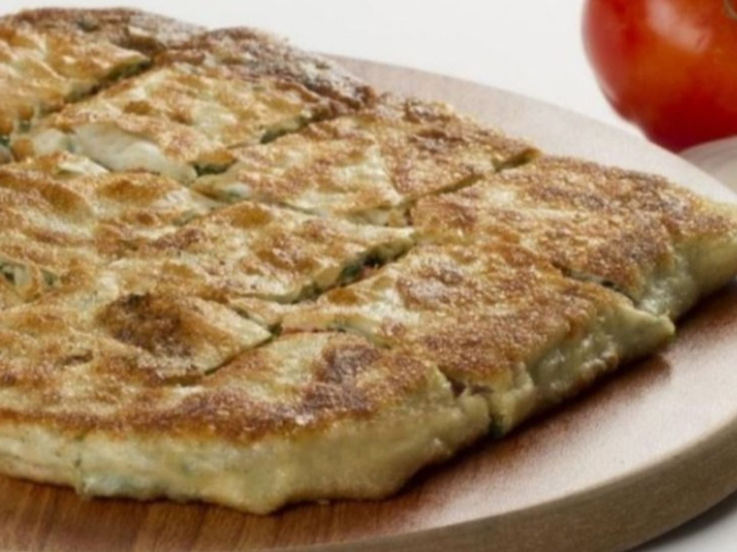 Salty Cheese Mutabbaq Combined With Olive Slices