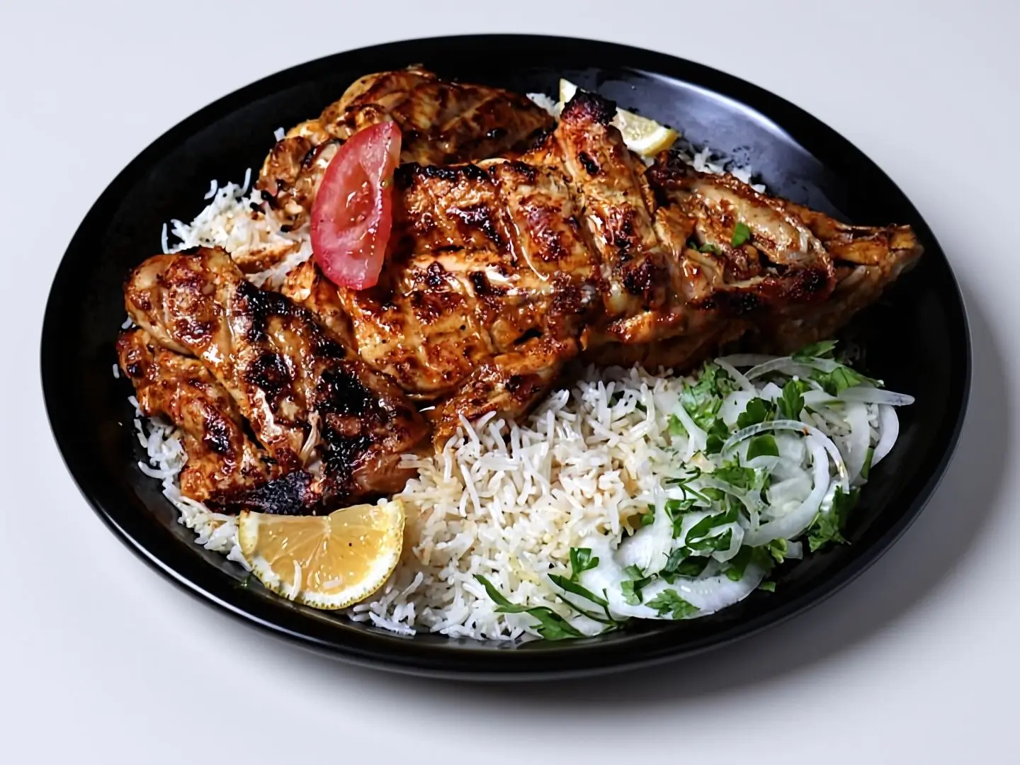 نصف دجاج على الفحم مع الأرز