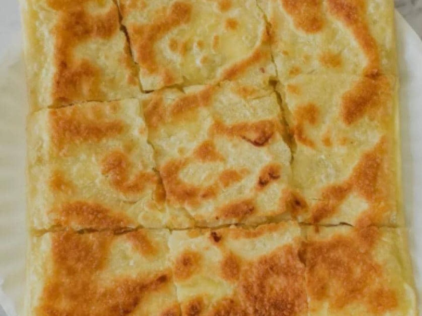 مطبق بالجبن السائل