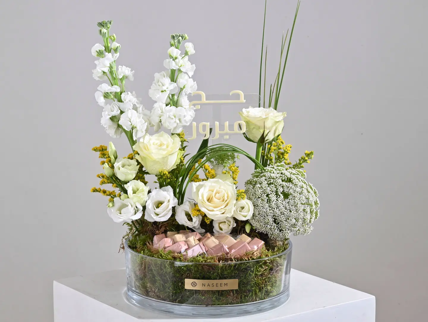 White Floral Arrangement With Chocolate
