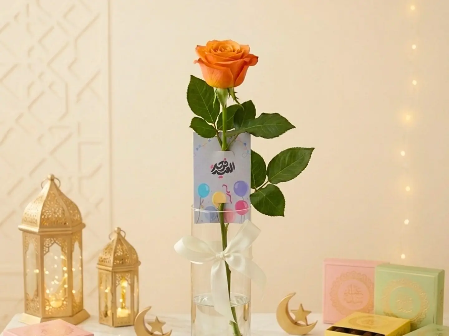 وردة برتقالية مع كرت العيد
