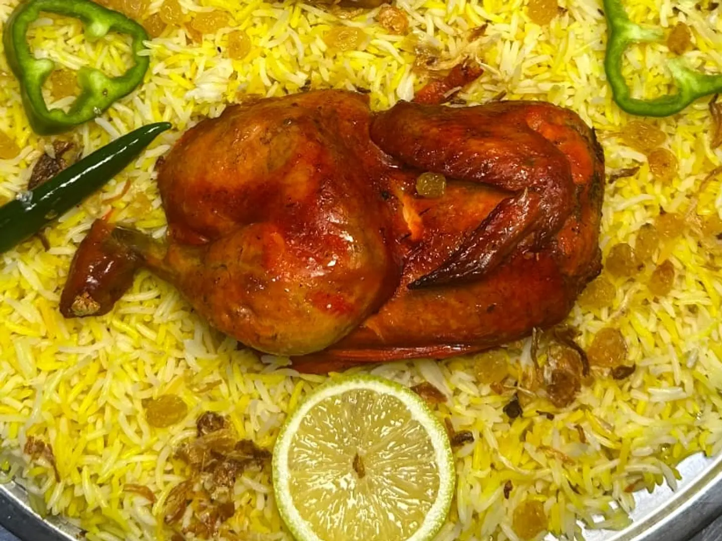 نص دجاجة حنيذ