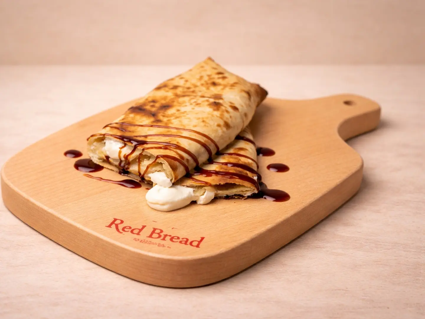 خبز تنور بجبنة المثلثات بالدبس