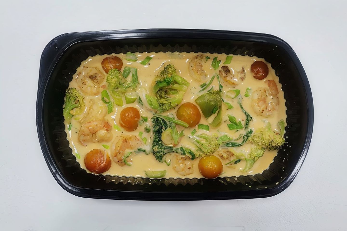 Keto Meal Of Shrimp With Creamy Butter Sauce, Broccoli And Vegetables