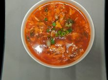 شوربة دجاج حارة حامضة