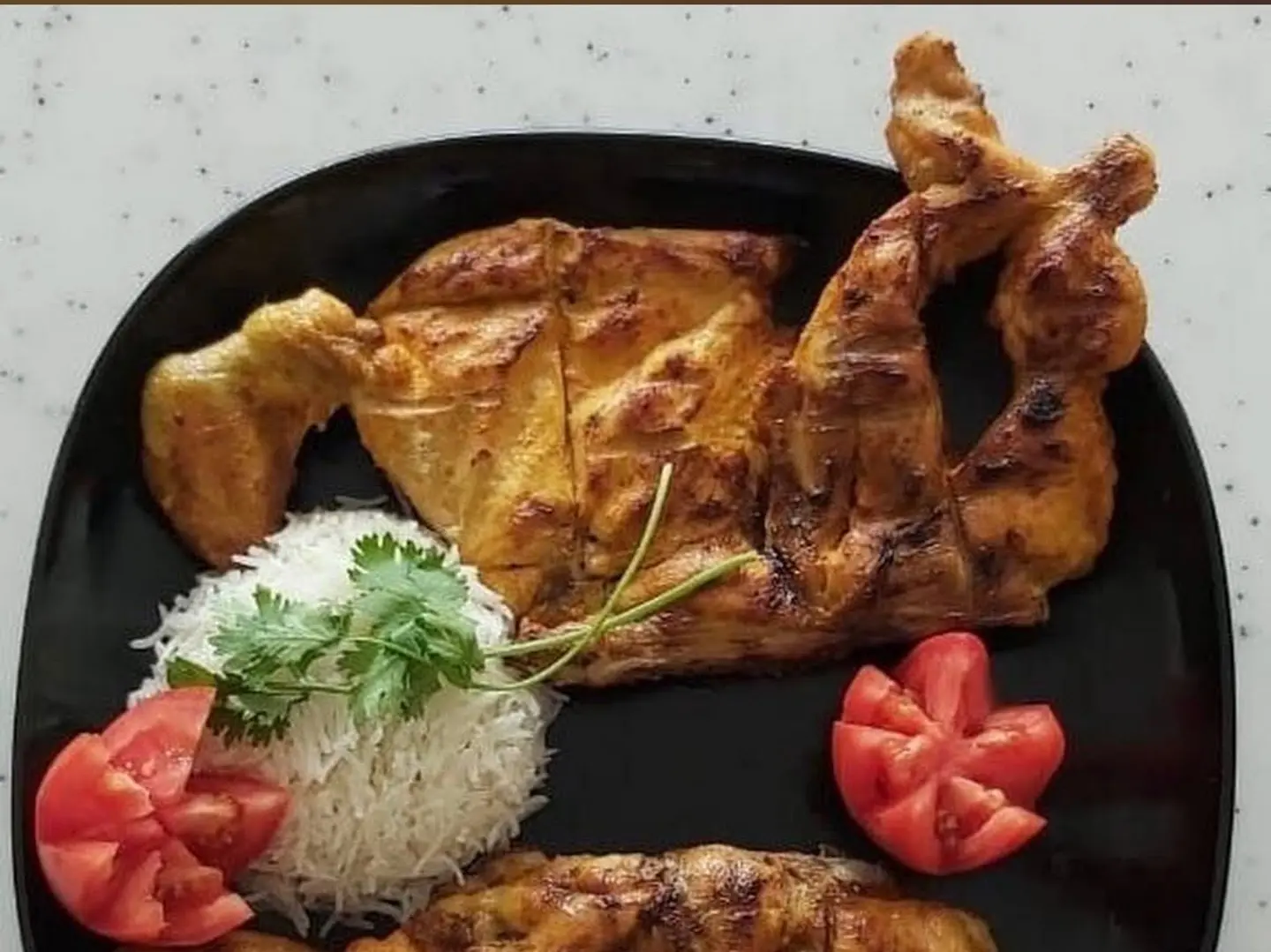 نصف دجاج على الفحم مع الرز