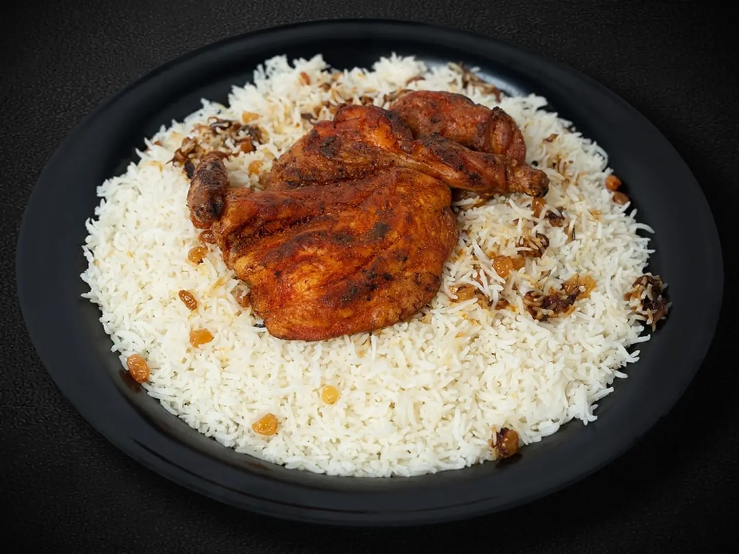 نصف حبة دجاج مظبي حار مع أرز بشاور