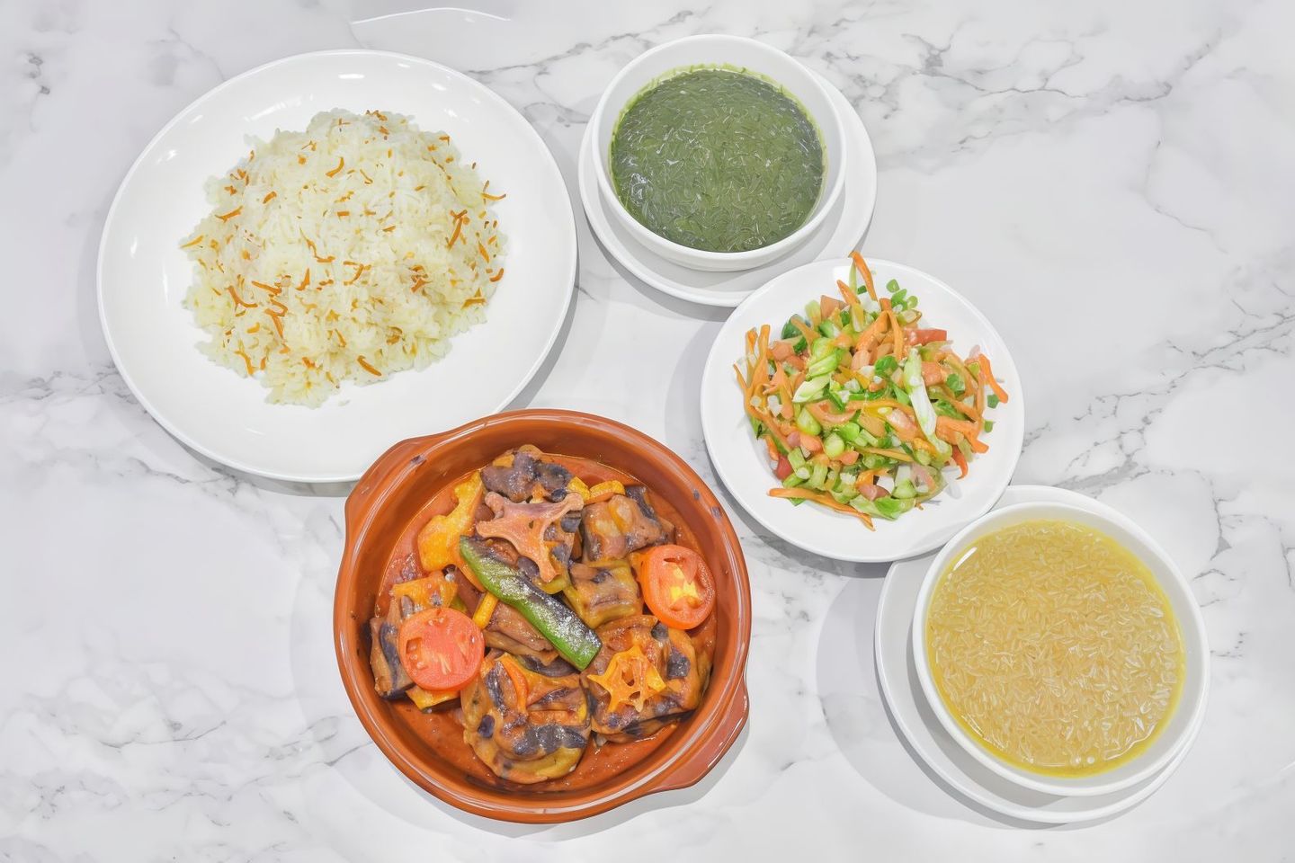 طاجن عكاوى مع ارز وخضار