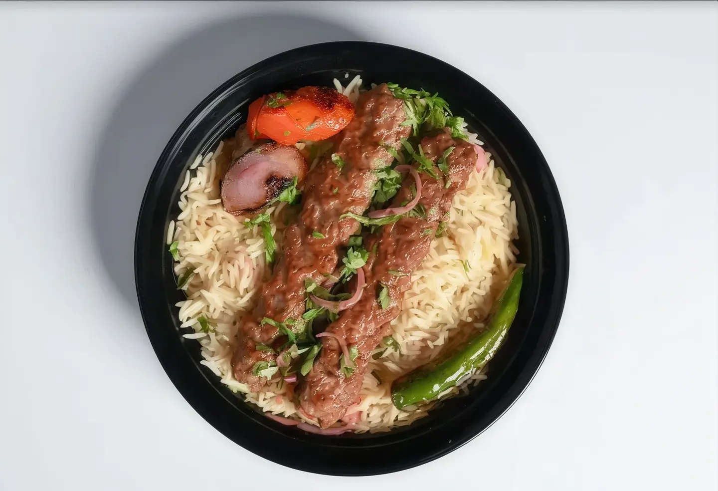 Two Skewers Of Lamb Kebab With Ric Tahini Sauce And Hot Dakou