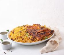 نصف دجاج على الفحم مع الأرز