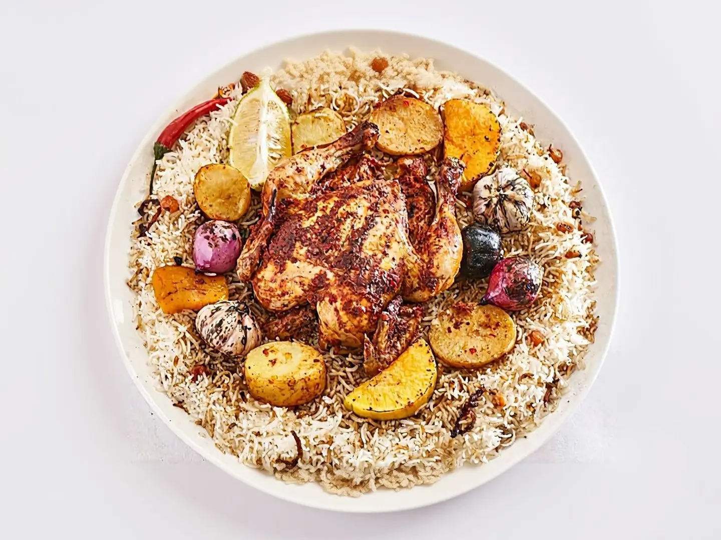 نصف دجاج مكنون بالخضار رز شعبي