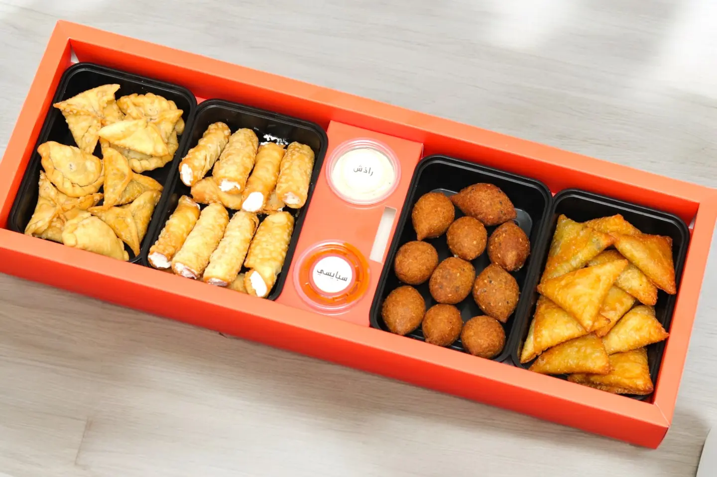 A Box Of 4 Pieces Of Assorted Lovely Samosas Puffs Rolls And Kibbeh