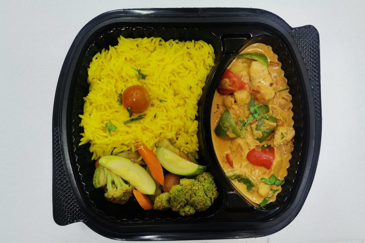 Creamy Chicken Meal With Yellow Rice And Sauteed Vegetables