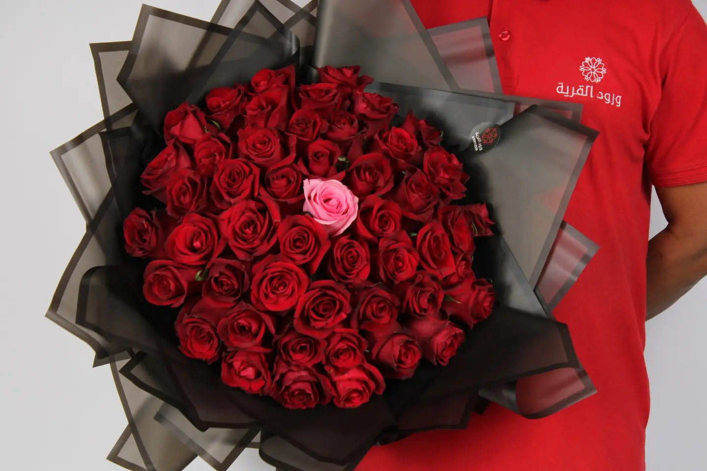 Bouquet Of Fifty Red And One Pink